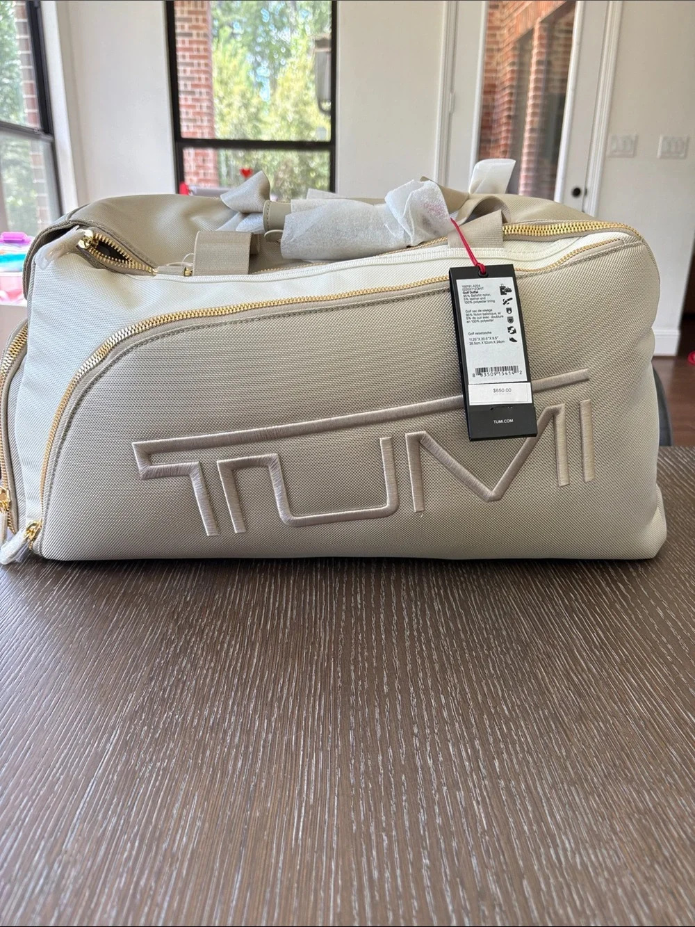 Tumi Beige Canvas Duffel with Gold Hardware